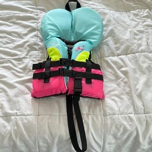 Boating vest for infant, girls. Size infant under 30 lbs. USCG approved.